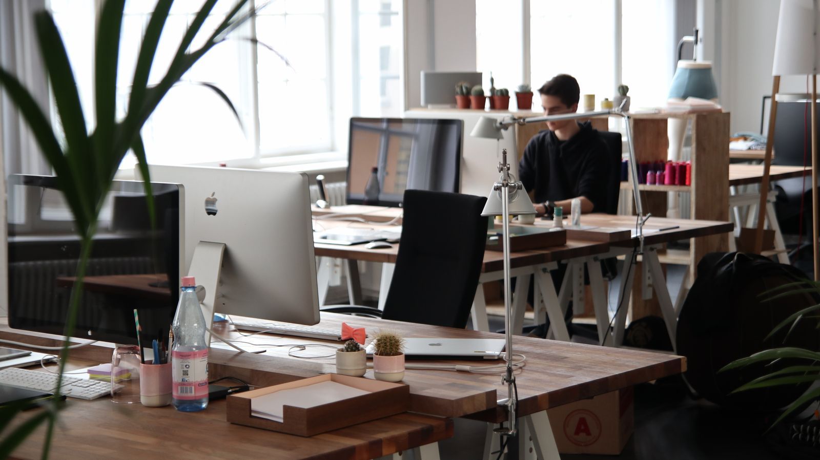 Creative office space with desks ready before opening